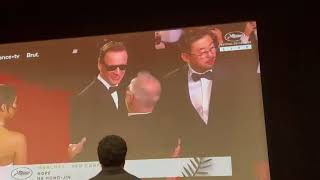 Michael Fassbender Shares a Laugh With Thierry Frémaux at the "Hope" Premiere Red Carpet at Cannes