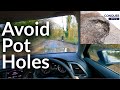 How to judge where your wheels are when driving to avoid pot holes