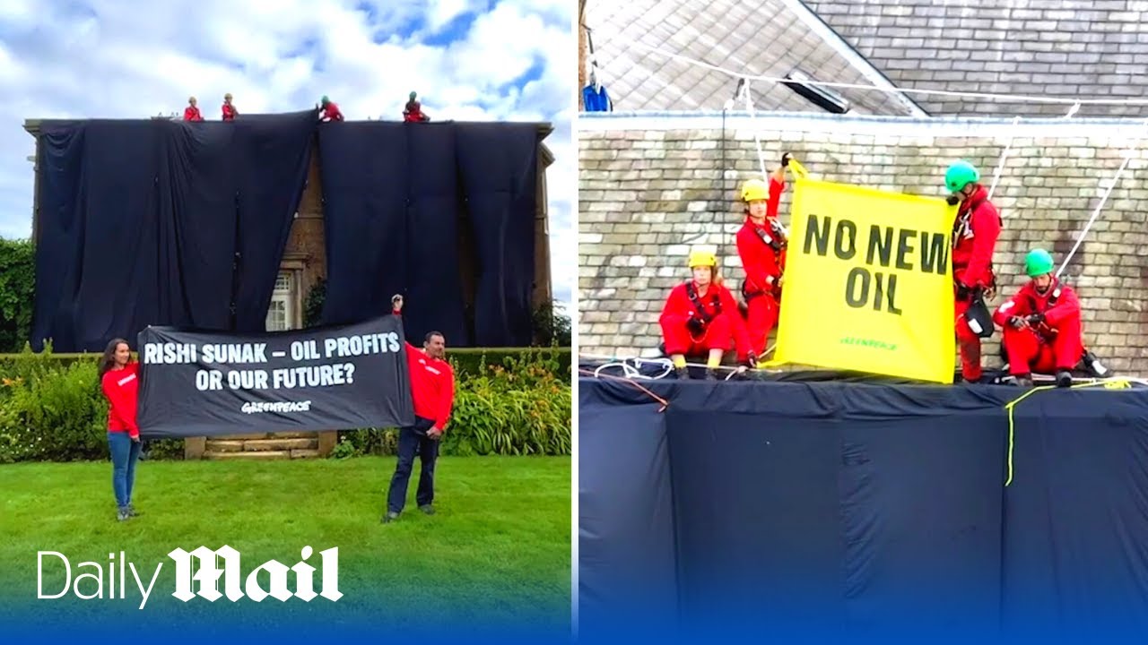 Unbelievable moment Greenpeace activists drape Rishi Sunak's mansion in black fabric