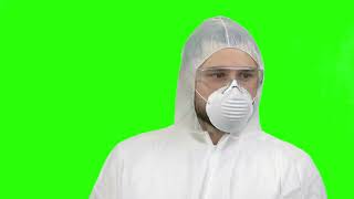 Man with PPE protecting himself from the virus -  Chroma Key - No Copyright