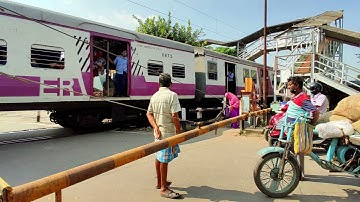 12 Coach EMU Local Train Skipping out Busy Rail Gate