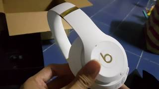 gold and white beats