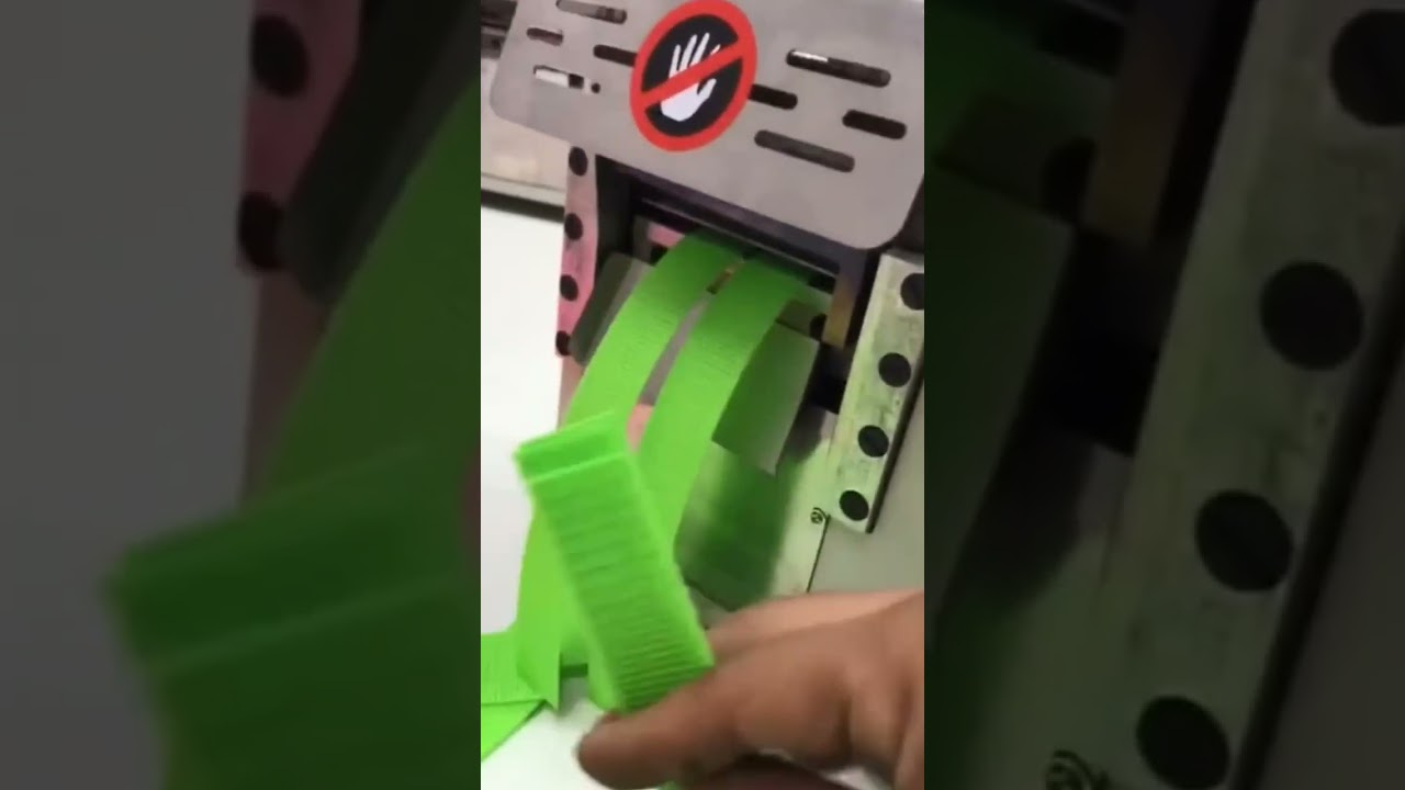 Loop handle cutting machine