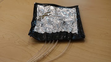 Soft Sensor Control of a Robot Swarm with Realtime Tactile Feedback