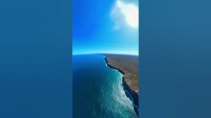 Flying down the coast south of Sydney, Australia in Stearman VH-PJS