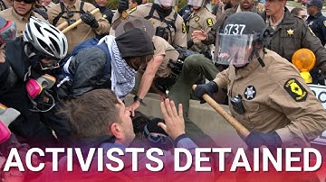 Chaos erupts in Chicago as protesters violently clash with police outside ICE facility