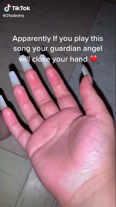YOUR GUARDIAN ANGEL WILL CLOSE YOUR HANDS IF YOU PLAY THIS SONG