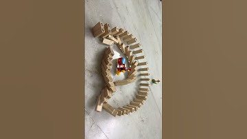 Jenga block domino effects for at sign @