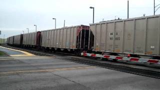 CSX 873 leading CEFX 1049 coal train at Narragansett Avenue