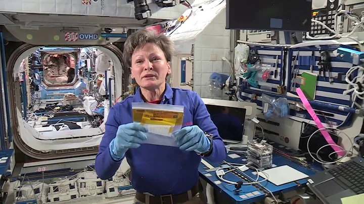 NASA Astronaut Peggy Whitson congratulates Genes i...