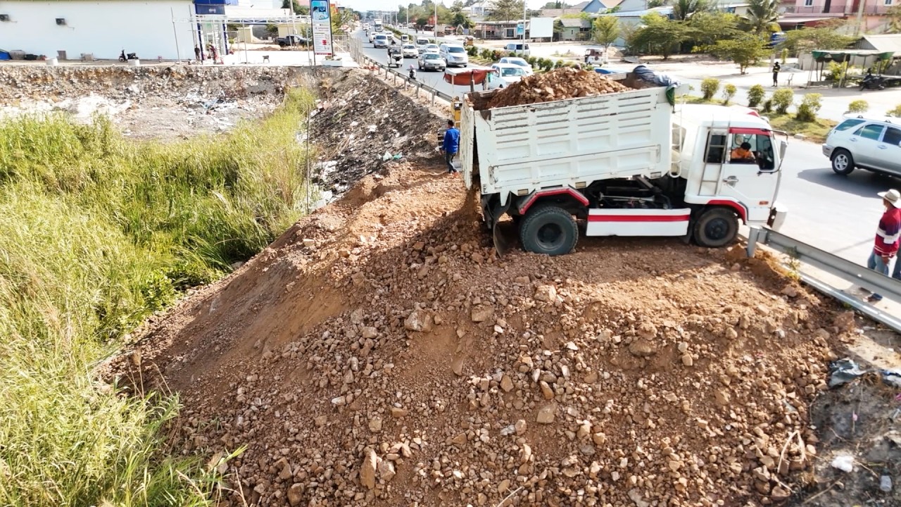 Nicely Landfill Task! Good Job Of Bulldozer Push Soils Pouring Low Land With Trucks Dumping Team