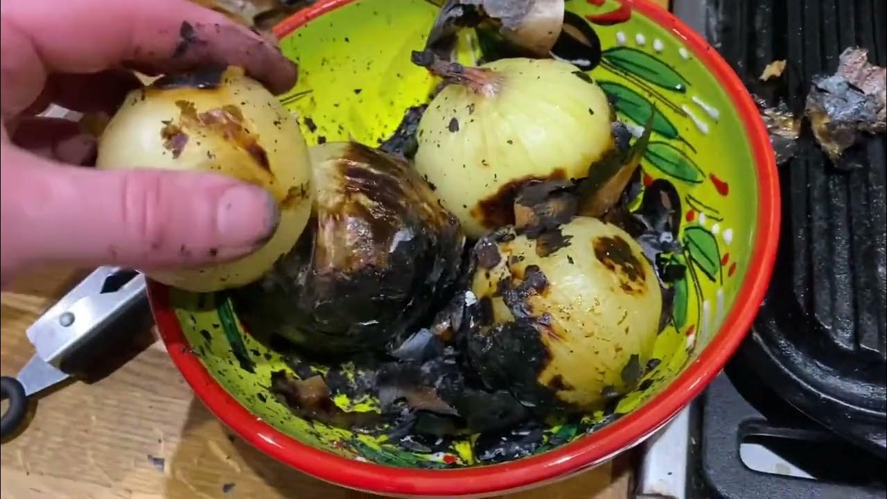 Dirty Cooking searing a joint of beef and roasting onions inside a