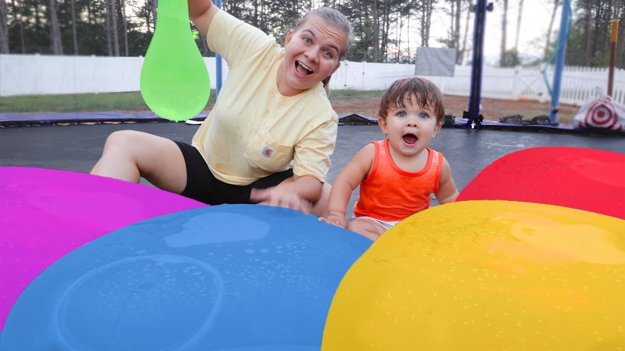GIANT WATER BALLOONS ON TRAMPOLINE! What happens?! YouTube