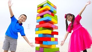 Emma & Andrew Pretend Play with Giant Colored Jenga Toy Blocks