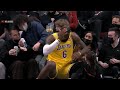 LeBron James Got Hit In The Head And He Briefly Needed To Sit Down On A Courtside Fan!