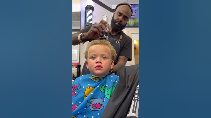First time to the barbershop✂️ #haircut #toddlerhaircut #curlyhaircut