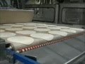 Ayash Engineering Tortilla Divider & Rounder working with Lawrence Mega Line Press & Oven 2 lines