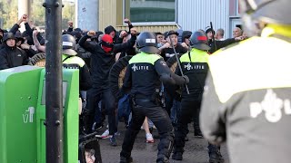 Politie ME grijpt in bij rellen na Ajax - Feyenoord