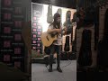 Amber russell playing at music area cases booth of namm 2019