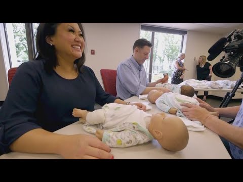 KING 5's Michelle Li learns how to change a diaper before her baby arrives