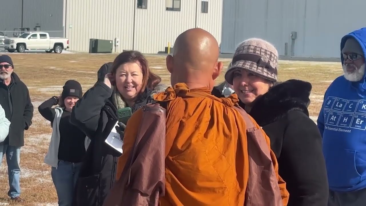 Buddhist monks, supporters battle freezing temperatures after winter storm