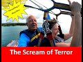 Terrifying screams during our epic first parasail ride on the ultimate world cruise