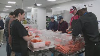 Gov. Mills rolls up her sleeves to help out Preble Street's food security hub Wealth