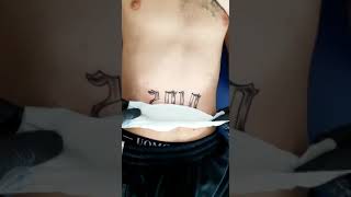 Short Tattoo 2010 belly