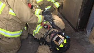 Lowering a Down Firefighter Out a Window