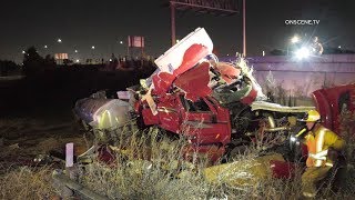 Tanker Truck Overturns On Freeway Spilling Transmission Fluid In Cerritos