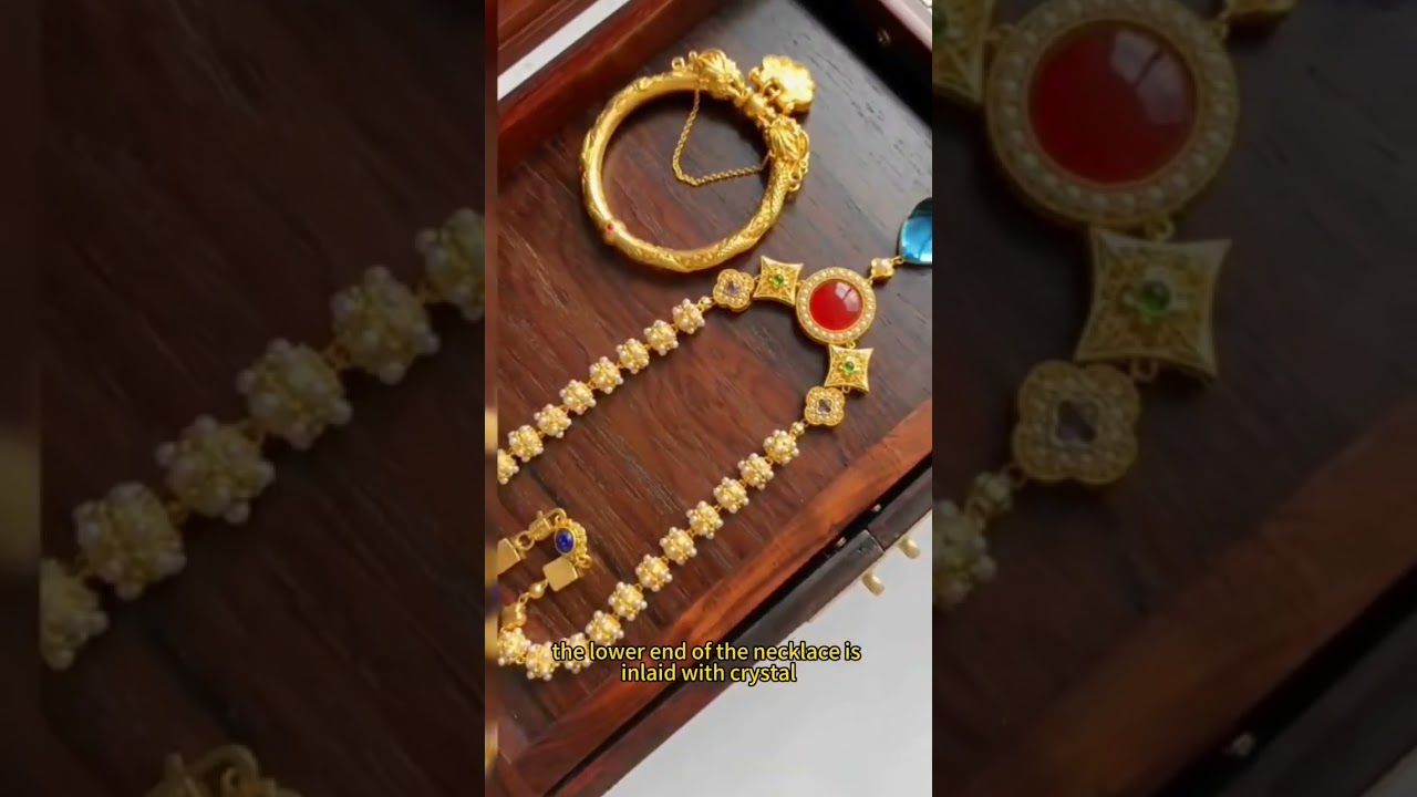 Crafted with 12 pure gold beads & sparkling pearls. Personalize yours now