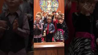 Christmas program at preschool, Misha is 4