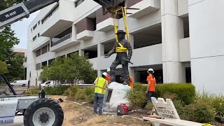 See workers remove statue of John Sutter in midtown Sacramento