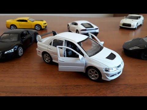 Машина Велли Митсубиси Лансер Welly Mitsubishi Lancer Коллекционные машины
