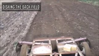 DISCING THE BACK FIELD TO PLANT WHEAT