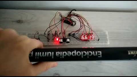 Park sensor with LEDs, buzzer, ultrasonic HC-SR04 +, and 4 Digit 7 Segment Display