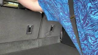 How to operate the power 2nd and 3rd row in the Travers  and Acadia