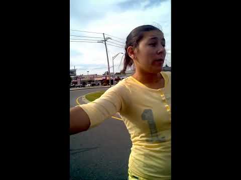 Girl fight !  Epic street drama as two girls square off in the street over car wreck