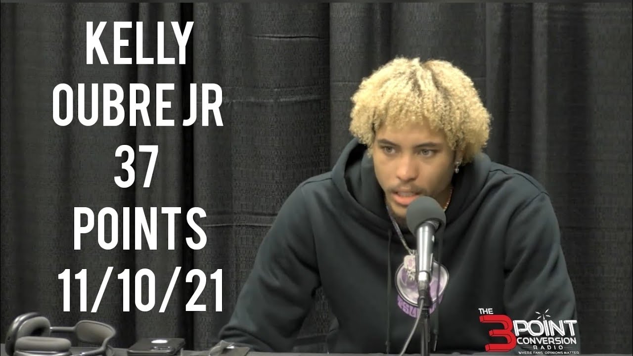 Kelly Oubre Jr. almost breaks the mic headbanging during interview