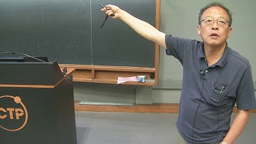 Majorana quantization and half integer thermal Hall conductance in a Kitaev spin liquid