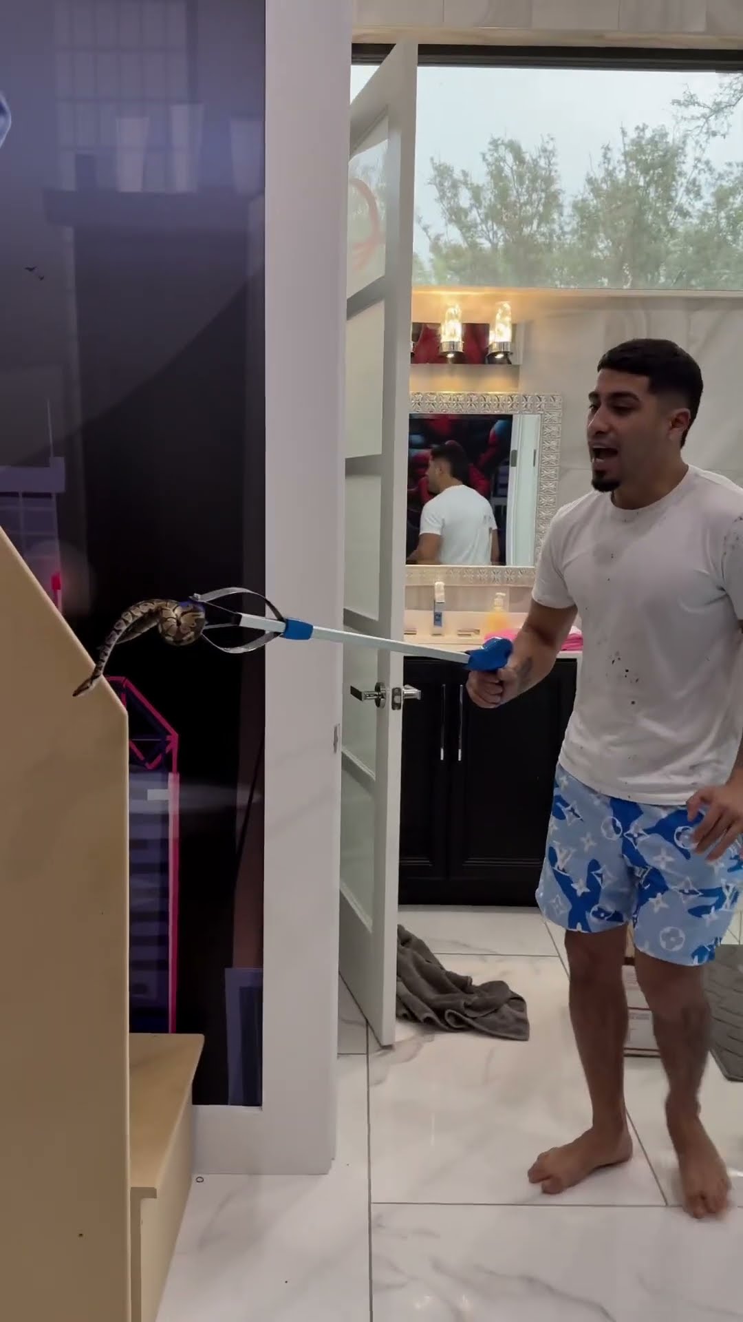 Dad chases mom and kids with REAL snake! #shorts