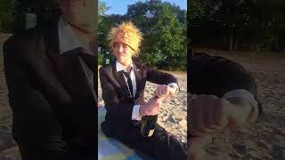 Donald Trump a split personality opens a bottle of Champagne