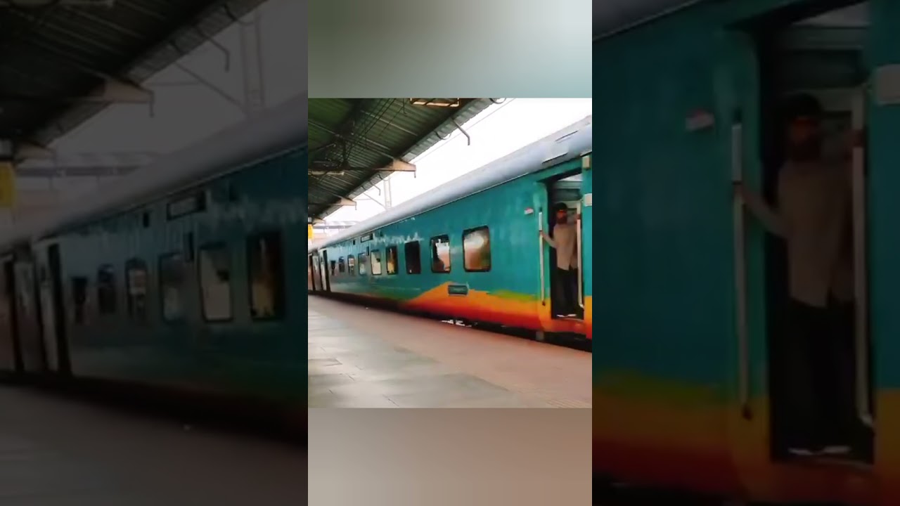 LHB Coach Crossing - Look at the silly man getting down of a moving train