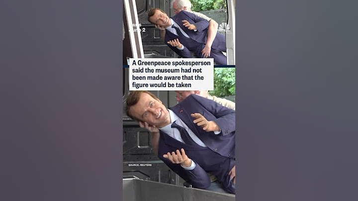 Greenpeace activists take wax figure of French President Emmanuel Macron from museum for protest