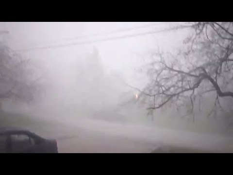 cold brew coffee Hail, rain fly in sideways in Ontario man's front yard
