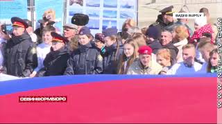 В Севастополе на площади Нахимова развернули 70-метровый флаг России
