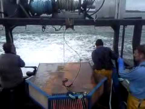 The crew of Fishing vessel Albacore try out their gear before the start of the cockle fishing season. Video was taken off Clogherhead on September 27th 2009. Crew members Noel Matthews, Anthony Matthews and Toffo Devlin