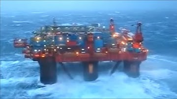 Piano Thru Delay With Pitch Shifting And Accompanied By Pictures Of Oil Platforms In The Ocean