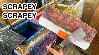 satisfying wax cleaning and scraping