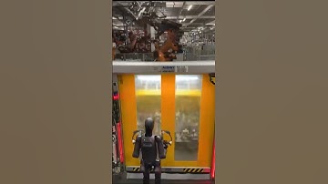 Humanoid robot working at a BMW factory